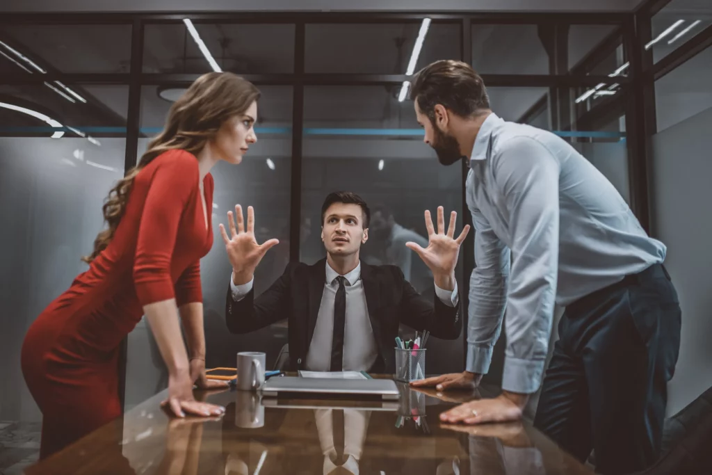 A Couple Fighting In Their Attorney's Office.